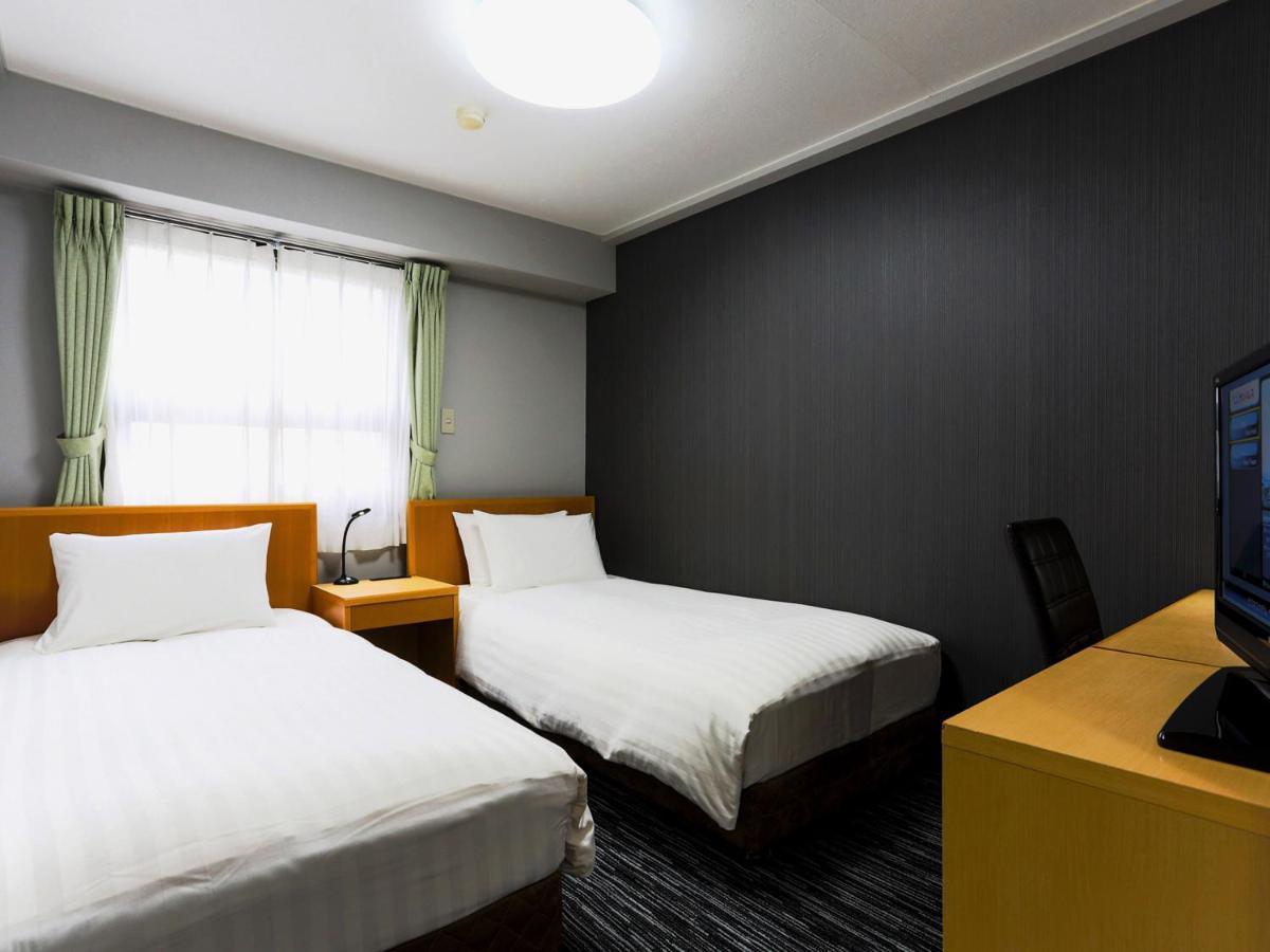 Business Hotel Sunpalace Tokió Kültér fotó